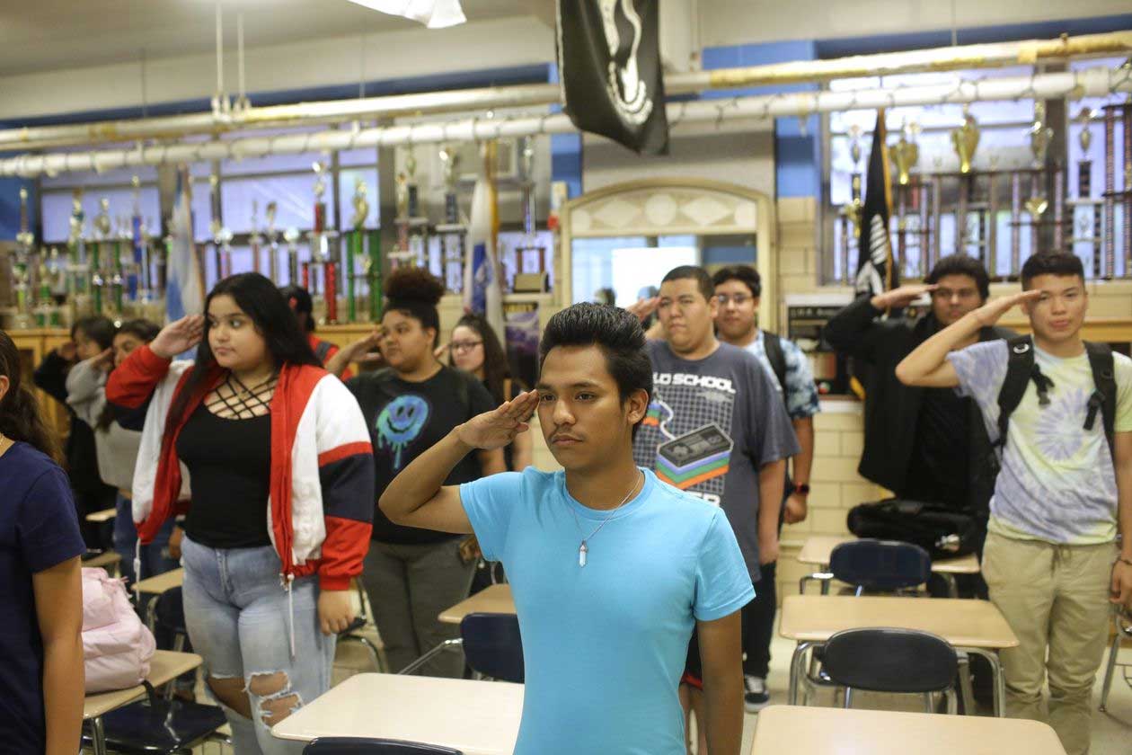 IMAGE 2 JROTC Students at a Chicago school saluted during a meeting where Sgt. Tejada spoke. PHOTO: JOSHUA LOTT FOR THE WALL STREET JOURNAL