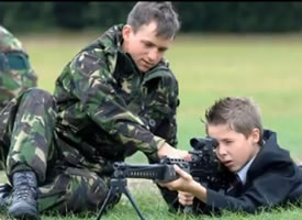 recruiter trains youth on military rifle